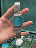 GUCI Silver Stainless Steel Turquoise Blue Dial Luxury Watch – Sport Edition