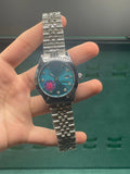 RLX Stainless Steel Dress Watch with Teal Blue Diamond Dial, Smooth Bezel, and Jubilee Bracelet