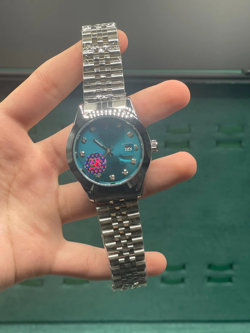 RLX Stainless Steel Dress Watch with Teal Blue Diamond Dial, Smooth Bezel, and Jubilee Bracelet