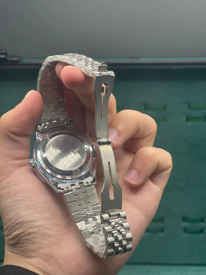 RLX Stainless Steel Dress Watch with Teal Blue Diamond Dial, Smooth Bezel, and Jubilee Bracelet