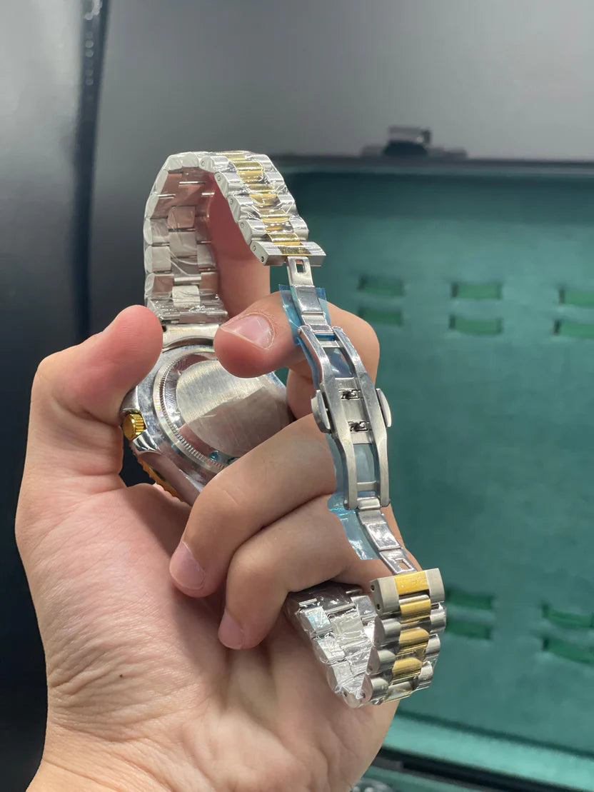 RLX Two-Tone Dive Style Watch with Green Dial, Gold Bezel, and Jubilee Bracelet